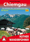 Das Bild zeigt den Rother Wanderführer. Er ist oben und unten rot und oben steht "Chiemgau" und unten steht "Rother Wanderführer" und das Symbol des Verlages. Es ist ein Bild von einem Berggasthof mit vielen Menschen im Biergarten abgebildet und im Hintergrund die Berge. Es steht auch noch "Die schönsten Alm-und Gipfelwanderungen - 60 Touren" auf der Vorderseite.