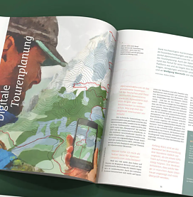 Auf diesem Bild zu sehen ein aufgeschlagenes Exemplar der alpinwelt