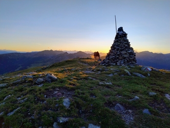 Sonnenuntergang vom Königsanger über der Radlseehütte